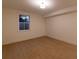 Bedroom boasts hardwood floors, a window providing natural light, and neutral wall color at 581 Sherwood Ne Rd, Atlanta, GA 30324