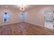 Spacious bedroom featuring hardwood floors, a chandelier, and a bathroom at 581 Sherwood Ne Rd, Atlanta, GA 30324