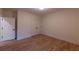 Bedroom featuring neutral walls, hardwood floors, and a spacious closet at 581 Sherwood Ne Rd, Atlanta, GA 30324