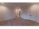 Bedroom features hardwood floors and three closets at 581 Sherwood Ne Rd, Atlanta, GA 30324