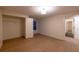 Bedroom with open closet and bright lighting at 581 Sherwood Ne Rd, Atlanta, GA 30324