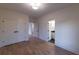 Bedroom featuring hardwood floors, double door closet and an ensuite bathroom for added convenience at 581 Sherwood Ne Rd, Atlanta, GA 30324