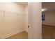 Walk-in closet featuring wood floors and white walls with wire shelving at 581 Sherwood Ne Rd, Atlanta, GA 30324