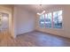 Bright dining room featuring beautiful hardwood floors and a modern chandelier at 581 Sherwood Ne Rd, Atlanta, GA 30324
