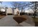 Beautiful new construction home with a two car garage and a sidewalk in front at 581 Sherwood Ne Rd, Atlanta, GA 30324