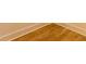 Close-up view of newly installed hardwood flooring and white trim at 581 Sherwood Ne Rd, Atlanta, GA 30324
