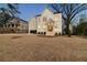 A well maintained two-story house boasts pristine landscaping, curb appeal, and a modern aesthetic at 581 Sherwood Ne Rd, Atlanta, GA 30324