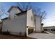Side view of the house featuring a garage with black door at 581 Sherwood Ne Rd, Atlanta, GA 30324