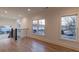 Hallway with hardwood floors and multiple windows offering great natural light and neighborhood views at 581 Sherwood Ne Rd, Atlanta, GA 30324