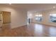 Bright hallway showcasing hardwood floors, white trim and two windows to the outside at 581 Sherwood Ne Rd, Atlanta, GA 30324