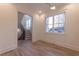 Spacious hallway featuring stairs and a large window with natural light at 581 Sherwood Ne Rd, Atlanta, GA 30324