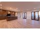 Open kitchen and living area with stainless appliances and hardwood floors at 581 Sherwood Ne Rd, Atlanta, GA 30324