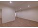 Bright living room featuring hardwood floors, recessed lighting, and neutral wall colors at 581 Sherwood Ne Rd, Atlanta, GA 30324