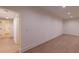 Bright living room with hardwood floors, base trim, and open doorway at 581 Sherwood Ne Rd, Atlanta, GA 30324