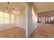 A bright living room with wood floors, a large window, and recessed lighting at 581 Sherwood Ne Rd, Atlanta, GA 30324