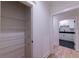 Walk-in pantry featuring a wire shelving system and white trim at 581 Sherwood Ne Rd, Atlanta, GA 30324