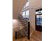 Beautiful staircase with wood steps and black iron railing at 581 Sherwood Ne Rd, Atlanta, GA 30324