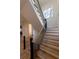 Beautiful staircase with wood treads and black iron railings at 581 Sherwood Ne Rd, Atlanta, GA 30324