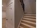 View of the staircase with hardwood steps and white risers at 581 Sherwood Ne Rd, Atlanta, GA 30324