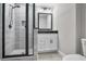 Bathroom featuring a tiled shower with glass enclosure and modern vanity at 202 Via Lucca, Woodstock, GA 30188