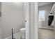 Powder room and walk-in closet, offering convenience and storage solutions at 202 Via Lucca, Woodstock, GA 30188