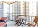 Spacious outdoor balcony with seating and city views at 300 W Peachtree St # 4A, Atlanta, GA 30308