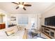 Living room with a door out to a balcony at 300 W Peachtree St # 4A, Atlanta, GA 30308