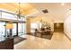 Elegant building lobby with marble walls, chandelier, and seating area at 300 W Peachtree St # 4A, Atlanta, GA 30308