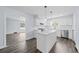 Modern kitchen with stainless steel appliances, center island, and sleek countertops at 463 Flint Trl, Jonesboro, GA 30236