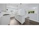 Updated kitchen with white cabinetry, a center island, and stainless steel appliances at 463 Flint Trl, Jonesboro, GA 30236