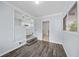 Cozy living space with views into the updated kitchen and back entrance at 463 Flint Trl, Jonesboro, GA 30236