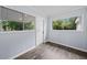 Inviting room with plank floors, natural light, and convenient access to the outdoors at 463 Flint Trl, Jonesboro, GA 30236