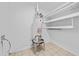 A practical utility room with updated systems and convenient shelving at 463 Flint Trl, Jonesboro, GA 30236