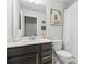 Well-lit bathroom with a modern sink, vanity, and neutral decor at 1566 Ridgebrook Downs, Mableton, GA 30126