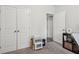 Bedroom with a double closet doors, neutral decor and natural light at 1566 Ridgebrook Downs, Mableton, GA 30126