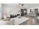 Spacious living room with hardwood floors, stylish furniture, and an open floor plan at 1566 Ridgebrook Downs, Mableton, GA 30126