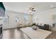 Cozy living room featuring a fireplace, ample natural light, and modern decor, creating an inviting space at 1566 Ridgebrook Downs, Mableton, GA 30126