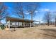 Covered picnic area with tables and grills, perfect for outdoor gatherings and Gathering fun at 1600 Temple Ave, Atlanta, GA 30337