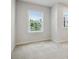 Bright bedroom featuring neutral walls, plush carpeting, and two large windows for ample natural light at 1891 Audubon Park Ln, Decatur, GA 30033