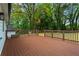 Expansive wooden back deck perfect for entertaining, overlooking lush greenery at 253 Mcintosh Avenue Ne, Marietta, GA 30060