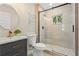 Bathroom with a modern vanity, decorative mirrors, and glass shower at 253 Mcintosh Avenue Ne, Marietta, GA 30060