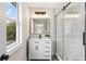 Modern bathroom with a glass-enclosed shower, a sleek vanity, and stylish fixtures at 253 Mcintosh Avenue Ne, Marietta, GA 30060