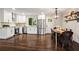 Open floorplan, kitchen with white cabinets, stainless steel appliances, and an eat-in kitchen at 253 Mcintosh Avenue Ne, Marietta, GA 30060