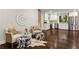 Open floorplan from living room to kitchen, featuring stylish decor and hardwood floors at 253 Mcintosh Avenue Ne, Marietta, GA 30060