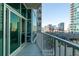 City view from a balcony with sliding glass doors leading into the condo at 923 Peachtree Ne St # 932, Atlanta, GA 30309