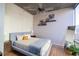 Cozy bedroom featuring neutral tones, hardwood floors, and ample natural light at 923 Peachtree Ne St # 932, Atlanta, GA 30309