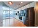 Modern kitchen featuring stainless steel appliances and an adjacent balcony at 923 Peachtree Ne St # 932, Atlanta, GA 30309