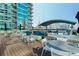 Stunning rooftop patio with ample seating, perfect for entertaining guests at 923 Peachtree Ne St # 932, Atlanta, GA 30309