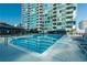 Relax and unwind by the sparkling swimming pool with comfortable lounge chairs at 923 Peachtree Ne St # 932, Atlanta, GA 30309