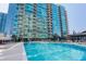 Enjoy the condo's refreshing swimming pool with views of the surrounding city at 923 Peachtree Ne St # 932, Atlanta, GA 30309